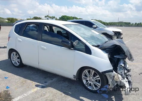 2009 Honda Fit Sport из США, поврежденный, VIN JHMGE88449S066993